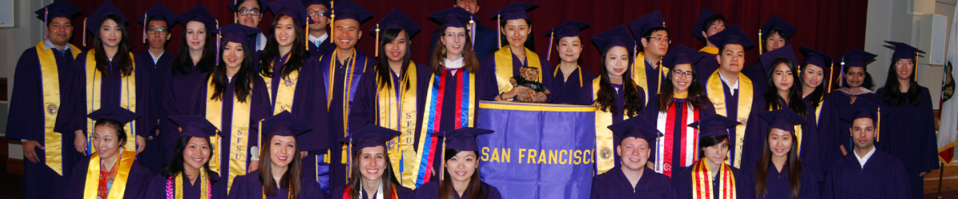 students in graduation robes