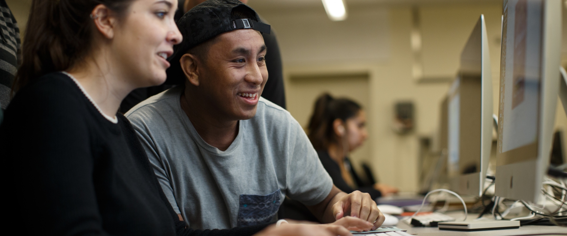 students looking at a computer screen together